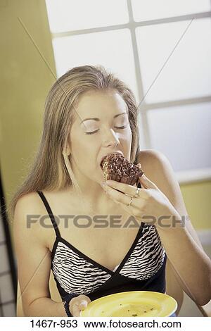 people, eating, woman, cake, blond, food, indulgence View Large Photo Image Stock Image - people, eating, woman, cake, blond, food, indulgence. Fotosearch