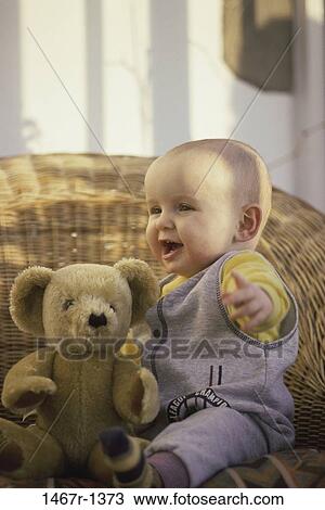 people, excitement, excited, baby, happy, stuffed animal, toy View Large Photo Image Stock Image - people, excitement, excited, baby, happy, stuffed animal, toy. Fotosearch