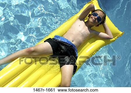 people, floating, water, pool, boy, goggles View Large Photo Image Stock Image - people, floating, water, pool, boy, goggles. Fotosearch