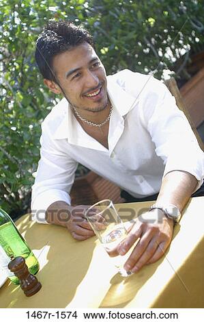 people, glass, water, smiling, table, sitting View Large Photo Image Picture - people, glass, water, smiling, table, sitting. Fotosearch