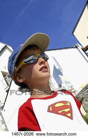 people, hat, sunglasses, boy, outdoors, cap, looking View Large Photo Image Stock Photograph - people, hat, sunglasses, boy, outdoors, cap, looking. Fotosearch