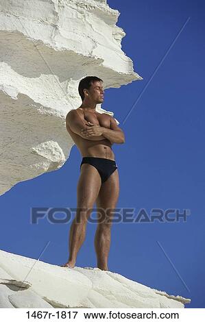 people, Hispanic, rocks, tanned, serious, posed View Large Photo Image Stock Photo - people, Hispanic, rocks, tanned, serious, posed. Fotosearch