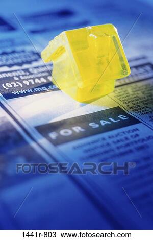 Stock Image - people, home, moving, newspaper, house, still life, new home. Fotosearch