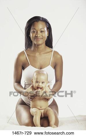 people, mother, baby, family, parent, indoors View Large Photo Image Stock Photo - people, mother, baby, family, parent, indoors. Fotosearch