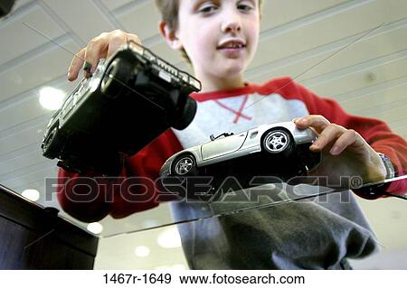 people, playing, boy, cars, child, play View Large Photo Image Stock Photo - people, playing, boy, cars, child, play. Fotosearch
