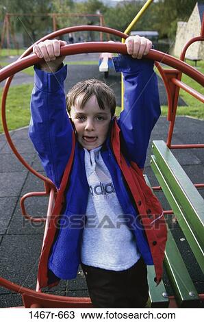 people, playing, hanging, active, jungle gym, playground, boy View Large Photo Image Stock Image - people, playing, hanging, active, jungle gym, playground, boy. Fotosearch