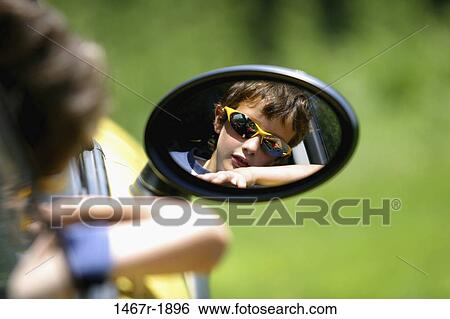 people, reflection, male, car, driving, sunglasses View Large Photo Image Stock Photograph - people, reflection, male, car, driving, sunglasses. Fotosearch