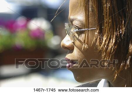 people, reflection, woman, profile, eyeglasses, outdoors View Large Photo Image Stock Photography - people, reflection, woman, profile, eyeglasses, outdoors. Fotosearch