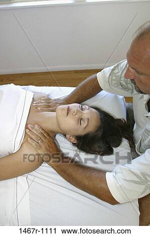 Stock Image - people, relaxation, relaxing, rubbing, treatment, shoulders. Fotosearch