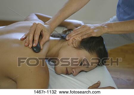 people, relaxation, stone, relaxing, rubbing, massage View Large Photo Image Stock Image - people, relaxation, stone, relaxing, rubbing, massage. Fotosearch