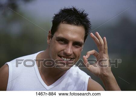 Picture - people, smiling, gesturing, outdoors, smile. Fotosearch