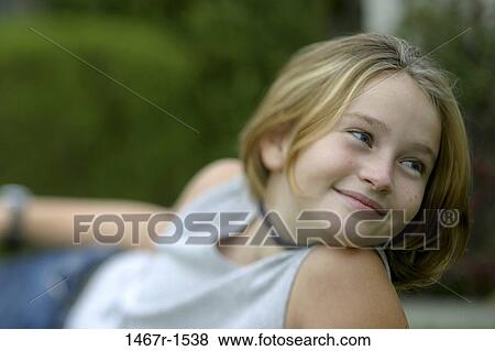 people, smiling, girl, outdoors, relaxing, smile View Large Photo Image Stock Photo - people, smiling, girl, outdoors, relaxing, smile. Fotosearch
