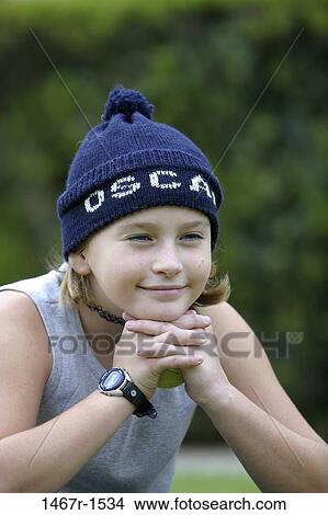 people, smiling, hat, watch, girl, outdoors, cap View Large Photo Image Picture - people, smiling, hat, watch, girl, outdoors, cap. Fotosearch