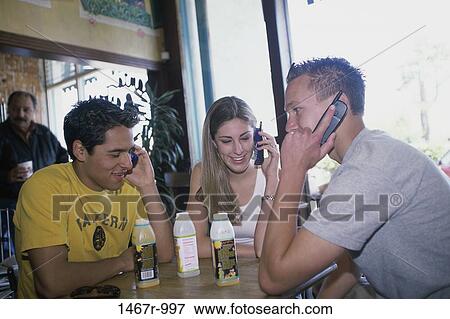 people, smiling, listening, bottles, friends, beverages View Large Photo Image Stock Photo - people, smiling, listening, bottles, friends, beverages. Fotosearch