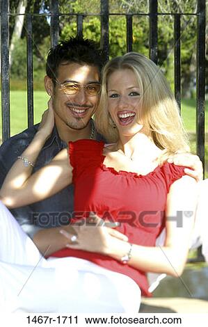 people, smiling, railing, couple, eyeglasses, sitting, laughing View Large Photo Image Stock Image - people, smiling, railing, couple, eyeglasses, sitting, laughing. Fotosearch