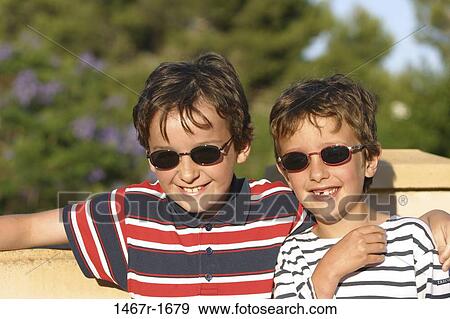 people, smiling, sitting, sunglasses, stripes, outdoors View Large Photo Image Stock Photo - people, smiling, sitting, sunglasses, stripes, outdoors. Fotosearch
