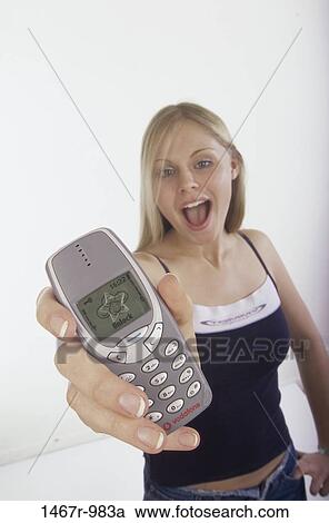 people, smiling, telephone, phone, holding, smile, blond View Large Photo Image Stock Image - people, smiling, telephone, phone, holding, smile, blond. Fotosearch