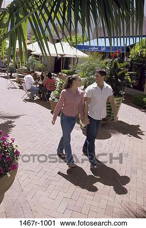 people, smiling, walking, couple, cafe, outdoors, restaurant View Large Photo Image Stock Image - people, smiling, walking, couple, cafe, outdoors, restaurant. Fotosearch
