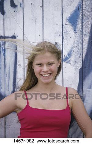 people, smiling, windy, wind, outdoors, breeze, smile View Large Photo Image Stock Image - people, smiling, windy, wind, outdoors, breeze, smile. Fotosearch