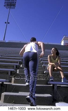 people, stairs, climbing, couple, train, sports, achievement View Large Photo Image Stock Image - people, stairs, climbing, couple, train, sports, achievement. Fotosearch