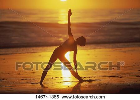 people, sunset, beach, stretching, silhouette, health View Large Photo Image Stock Photography - people, sunset, beach, stretching, silhouette, health. Fotosearch