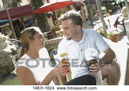 people, talking, couple, conversation, drinking, cafe View Large Photo Image Picture - people, talking, couple, conversation, drinking, cafe. Fotosearch
