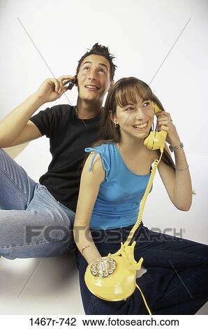 people, telephone, talking, phone, teens, brunette, cell phone View Large Photo Image Stock Image - people, telephone, talking, phone, teens, brunette, cell phone. Fotosearch
