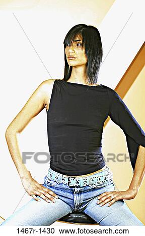 people, woman, Asian, daydreaming, Hispanic, serious, contemplating View Large Photo Image Stock Image - people, woman, Asian, daydreaming, Hispanic, serious, contemplating. Fotosearch