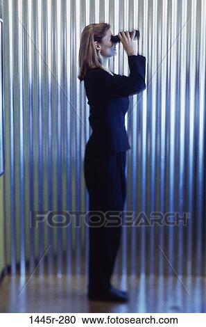 people, woman, binoculars, curious, brunette, indoors View Large Photo Image Stock Image - people, woman, binoculars, curious, brunette, indoors. Fotosearch