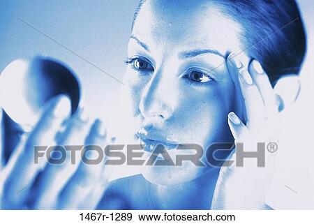 people, woman, blue, holding, mirror, makeup View Large Photo Image Stock Photo - people, woman, blue, holding, mirror, makeup. Fotosearch