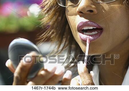 people, woman, brushing, outdoors, body parts, lips, makeup View Large Photo Image Stock Image - people, woman, brushing, outdoors, body parts, lips, makeup. Fotosearch