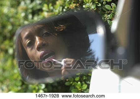 people, woman, car, mirror, outdoors, transportation View Large Photo Image Stock Photo - people, woman, car, mirror, outdoors, transportation. Fotosearch