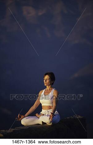 people, woman, meditation, sitting, health, outdoors, sports View Large Photo Image Picture - people, woman, meditation, sitting, health, outdoors, sports. Fotosearch