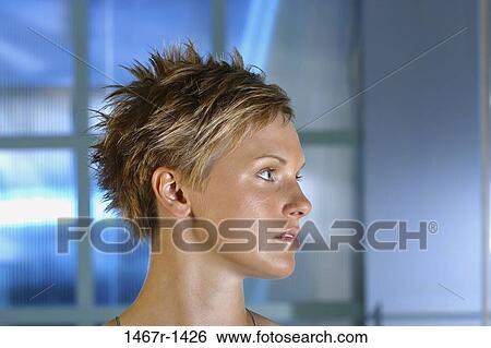 people, woman, profile, serious, brunette, short hair View Large Photo Image Stock Photograph - people, woman, profile, serious, brunette, short hair. Fotosearch