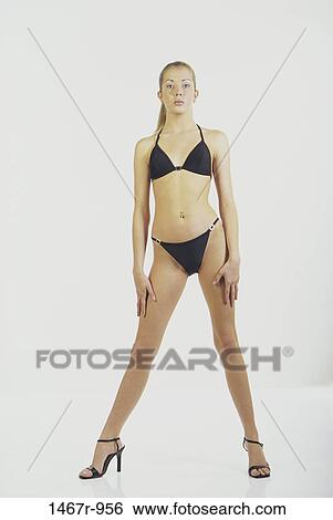 people, woman, shoes, serious, blond, posing View Large Photo Image Stock Photograph - people, woman, shoes, serious, blond, posing. Fotosearch