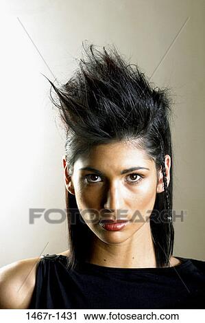 people, woman, staring, serious, brunette, unique View Large Photo Image Stock Image - people, woman, staring, serious, brunette, unique. Fotosearch