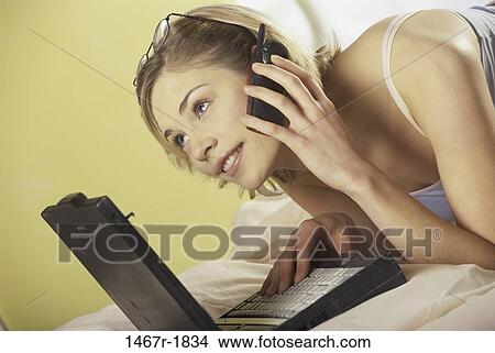 people, woman, telephone, computer, laptop, phone View Large Photo Image Picture - people, woman, telephone, computer, laptop, phone. Fotosearch