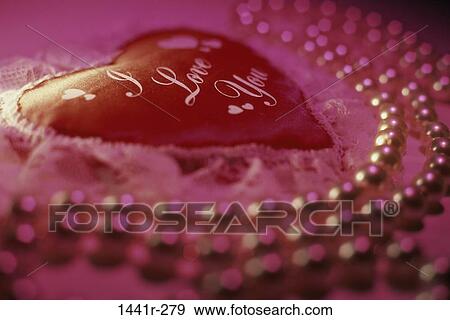 pink, romantic, jewelry, necklace, gift, present View Large Photo Image Stock Photo - pink, romantic, jewelry, necklace, gift, present. Fotosearch