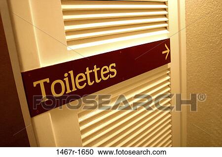 pointing, sign, arrow, direction, toilets, signage View Large Photo Image Stock Image - pointing, sign, arrow, direction, toilets, signage. Fotosearch