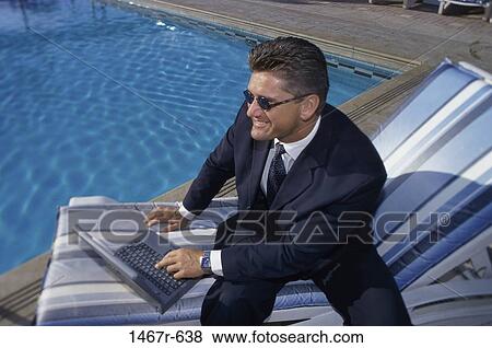 pool, computer, laptop, sunglasses, business View Large Photo Image Stock Photo - pool, computer, laptop, sunglasses, business. Fotosearch