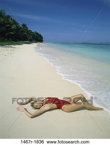 sand, people, woman, beach, shore, relaxing, resting View Large Photo Image Stock Photograph - sand, people, woman, beach, shore, relaxing, resting. Fotosearch