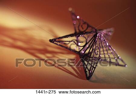 Stock Photography - shadow, Christmas, ornament, star, still life, decoration. Fotosearch