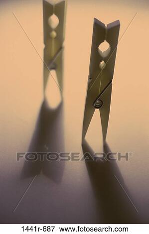 Stock Photo - shadow, still life, housewares, clothespins, Household still lifes. Fotosearch