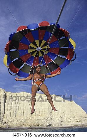 sky, outdoors, sports, adventurous, parasailing View Large Photo Image Stock Photograph - sky, outdoors, sports, adventurous, parasailing. Fotosearch