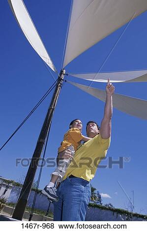 sky, people, Hispanic, holding, pointing, outdoors, point View Large Photo Image Stock Photo - sky, people, Hispanic, holding, pointing, outdoors, point. Fotosearch