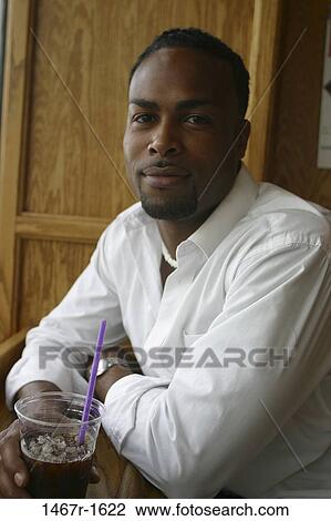 smiling, drinking, holding, straw, bar, restaurant View Large Photo Image Stock Image - smiling, drinking, holding, straw, bar, restaurant. Fotosearch