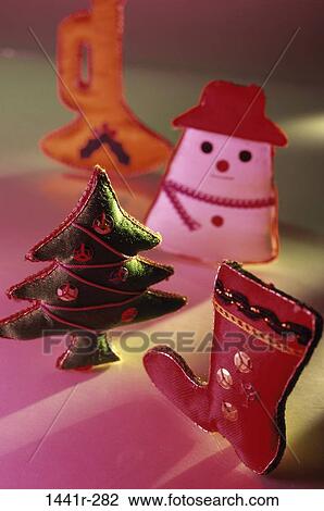Stock Image - tree, horn, Christmas, decorations, Christmas tree, stocking, still life. Fotosearch