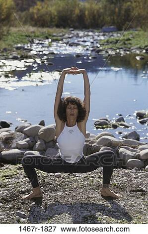 woman, meditation, stretching, concentrating, health, outdoors, sports View Large Photo Image Stock Photo - woman, meditation, stretching, concentrating, health, outdoors, sports. Fotosearch
