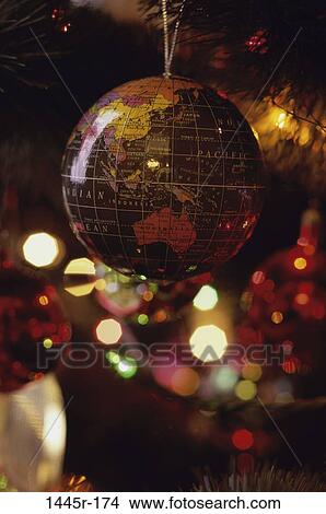 world, globe, Christmas, festive, ornament, still life View Large Photo Image Picture - world, globe, Christmas, festive, ornament, still life. Fotosearch