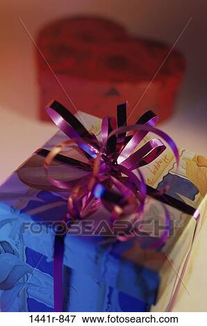 wrapped, gift, present, ribbon, still life, holiday View Large Photo Image Stock Photo - wrapped, gift, present, ribbon, still life, holiday. Fotosearch